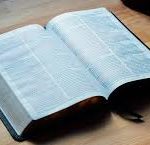 A book opened to the word of god.